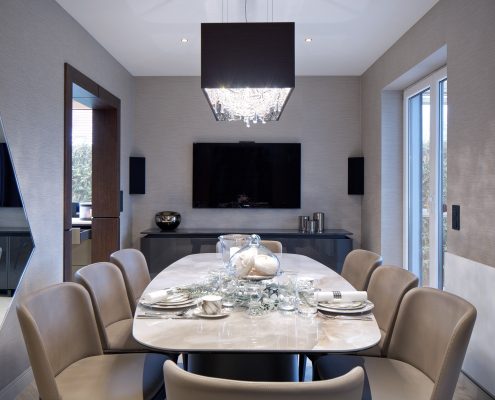 Atoll crystal chandelier shines in a private residence, Manooi Crystal Chandeliers