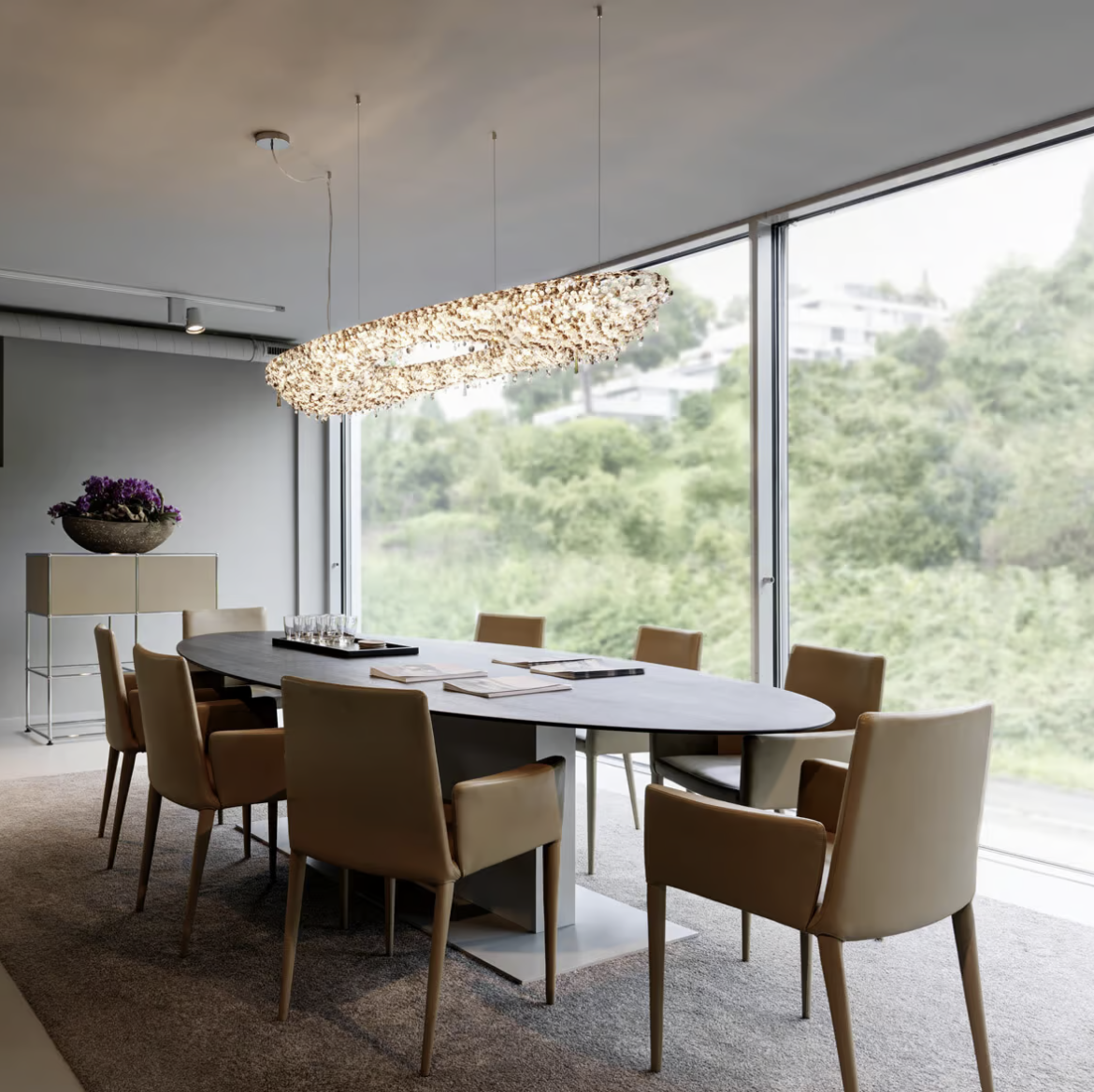 Artica crystal chandelier in a dining room.